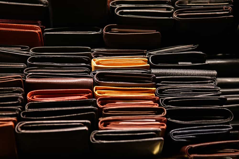 types of wallets for men- image of a stacks of wallets